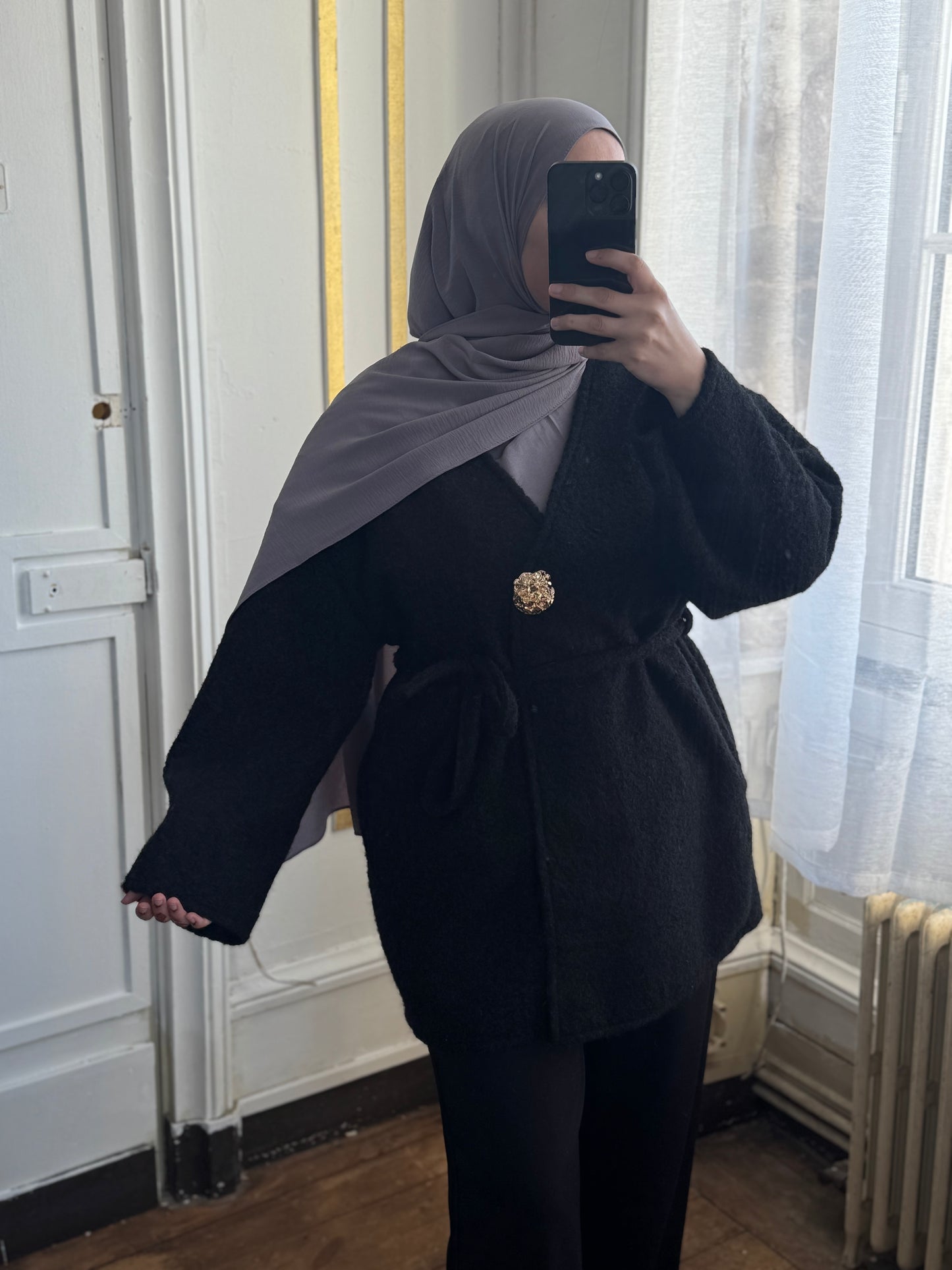 Veste noire bouton doré